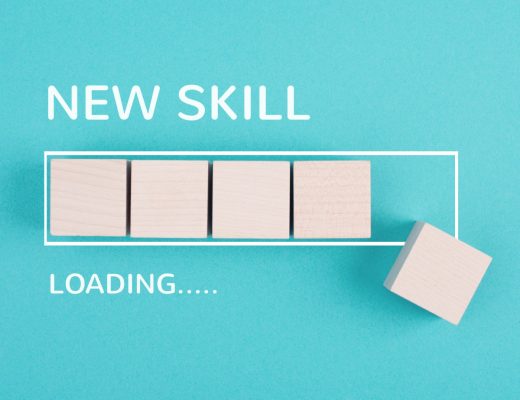 A piece of teal paper that reads "New Skill" and "Loading..."; in-between is a rectangular outline with blocks placed within.