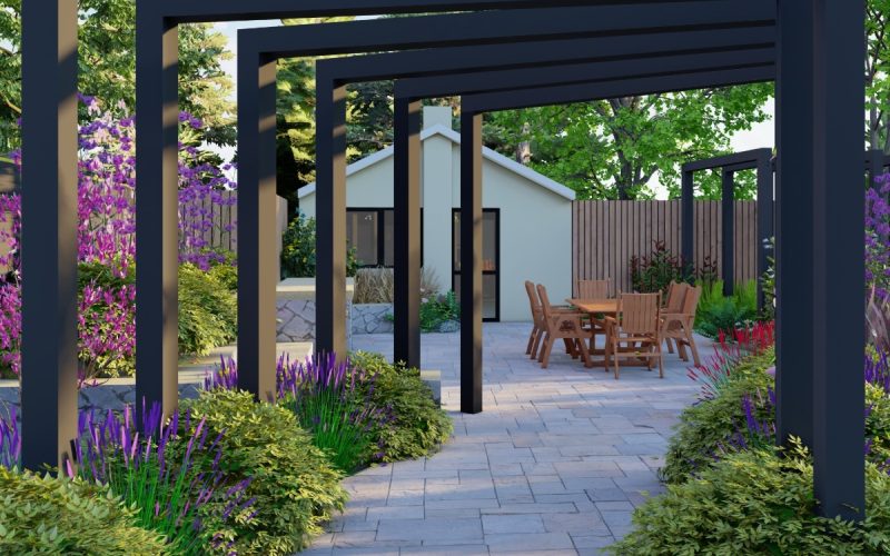 A long stone paver walkway lined with tall black pergolas in a residential backyard during the daytime.